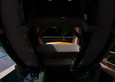 Substructure of a vertical raft conveyor with visible drive and guide rails.