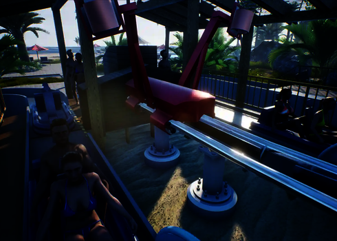 Menschen sitzen in blauen Schlauchbooten, bereit zum Start mit dem Slide Coaster.